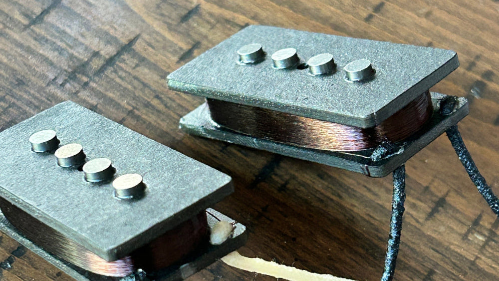 P-Bass Pickups On Wooden Table
