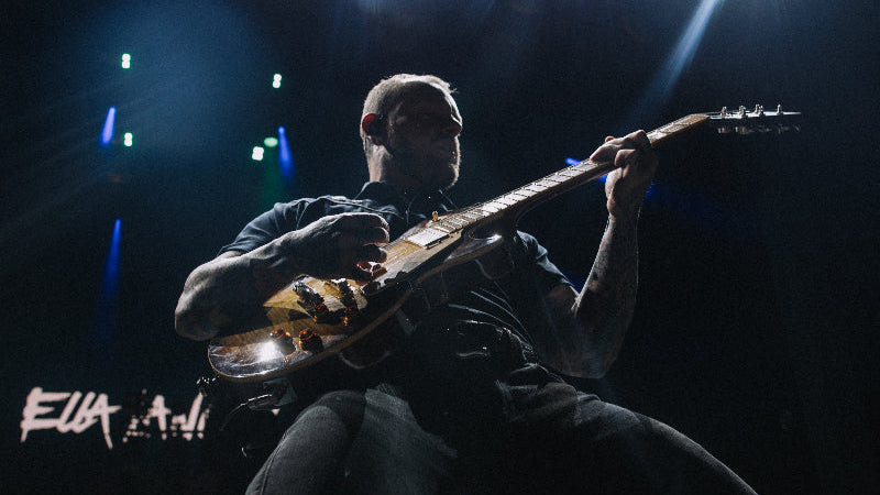 Featured artist Ben Flanders performing live on stage with guitar and Brickhouse Toneworks pickups