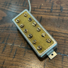 Brickhouse Toneworks Aged gold foil filtertron inside of a mini-humbucker